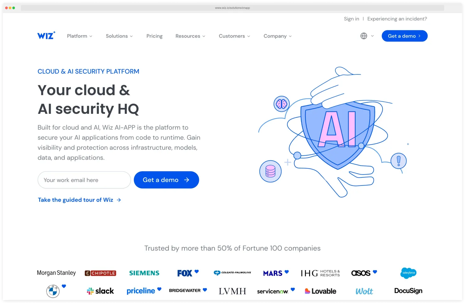 Wiz cloud and AI security platform landing page with the headline Your cloud and AI security HQ and the social proof line Trusted by more than 50% of Fortune 100 companies including Morgan Stanley, BMW, Slack, Siemens, FOX, and Salesforce — the most prominent CNAPP vendor whose security graph defined the attack-path correlation category